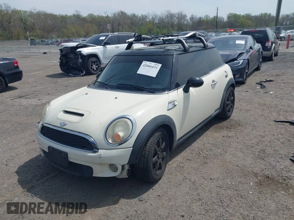 2007 MINI Hardtop S with VIN WMWMF73547TV31403, listed as a IAAI auction lot 42066433 with 156,730 mi miles and . Bid and sale history available at DreamBid. Image 2.