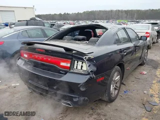 2011 Dodge Charger RT Plus with VIN 2B3CL5CT7BH521577, listed as a IAAI auction lot 41388986 with 135,009 mi miles. Bid and sale history available at carsss.com. Image 4.