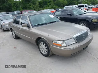 2004 Mercury Grand Marquis LS Premium z VIN 2MEFM75W84X621884, wystawiony jako IAAI lot #42229917 z przebiegiem 121 688 mil mil oraz . Historia ofert i sprzedaży dostępna na DreamBid. Obrazek 1.