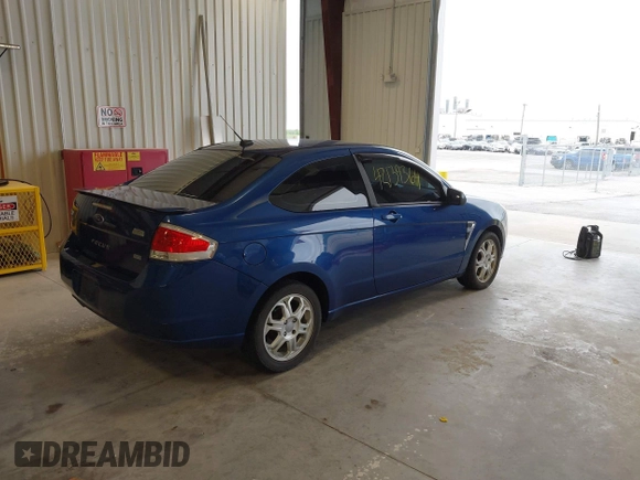 2008 Ford Focus SE with VIN 1FAHP33NX8W133127, listed as a IAAI auction lot 42139364 with 193,882 mi miles. Bid and sale history available at carsss.com. Image 4.