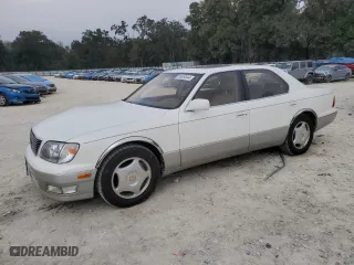 1998 Lexus LS 400 Luxury Sdn with VIN JT8BH28F4W0121580, listed as a Copart auction lot 86534644 with 143,254 mi miles and Salvage Title. Bid and sale history available at carsss.com. Image 1.