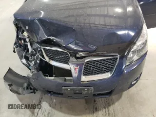 2010 Pontiac Vibe with VIN 5Y2SM6E07AZ403883, listed as a Copart auction lot 77337294 with 42,276 mi miles and Salvage Title. Bid and sale history available at carsss.com. Image 12.