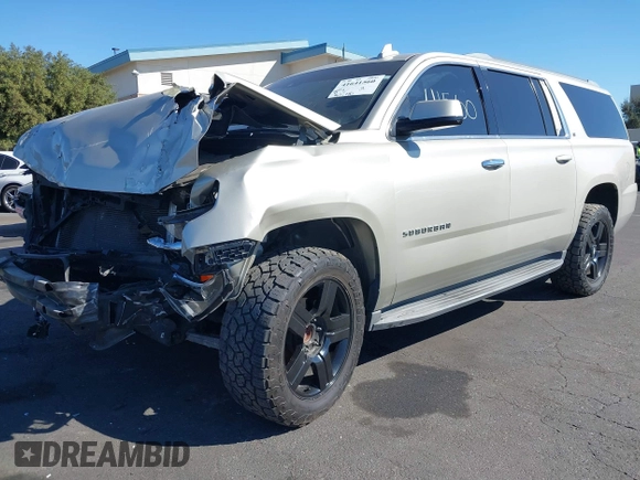 2015 Chevrolet Suburban LT z VIN 1GNSCJKC1FR608117, wystawiony jako IAAI lot #41641560 z przebiegiem 163 770 mil mil oraz . Historia ofert i sprzedaży dostępna na DreamBid. Obrazek 21.