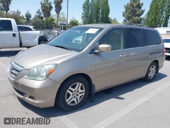 2005 Honda Odyssey EX-L with VIN 5FNRL38705B087733, listed as a IAAI auction lot 42165084 with 254,357 mi miles. Bid and sale history available at carsss.com. Image 2.