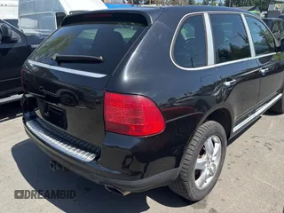 2006 Porsche Cayenne with VIN WP1AA29P06LA27007, listed as a Copart auction lot 55669435 with 81,189 mi miles and Salvage title. Bid and sale history available at DreamBid. Image 4.