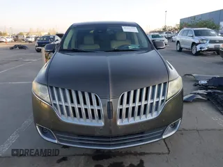 2011 Lincoln MKT with VIN 2LMHJ5AR8BBJ54371, listed as a IAAI auction lot 41147331 with 111,347 mi miles and . Bid and sale history available at DreamBid. Image 12.
