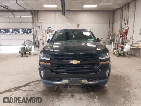 2017 Chevrolet Silverado 1500 LT with VIN 1GCVKREC0HZ384747, listed as a IAAI auction lot 37311343 with 67,390 mi miles. Bid and sale history available at carsss.com. Image 13.