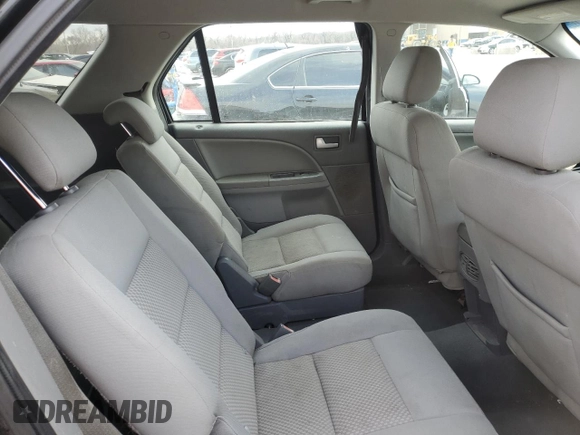 2006 Ford Freestyle SE z VIN 1FMZK01126GA23929, wystawiony jako Copart lot #48056535 z przebiegiem 217 022 mil mil oraz Szkoda całkowita • Salvage title. Historia ofert i sprzedaży dostępna na DreamBid. Obrazek 11.