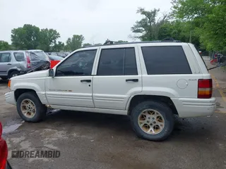 1997 Jeep Grand Cherokee Limited z VIN 1J4GZ78S1VC536295, wystawiony jako IAAI lot #42435292 z przebiegiem 310 005 mil mil oraz . Historia ofert i sprzedaży dostępna na DreamBid. Obrazek 15.