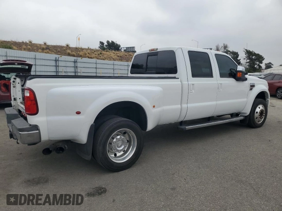 2010 Ford F-450 with VIN 1FTXW4CR9AEA96908, listed as a Copart auction lot 60075265 with 124,396 mi miles and Clean title. Bid and sale history available at DreamBid. Image 3.