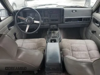 1994 Jeep Cherokee SE with VIN 1J4FJ28S4RL185992, listed as a Copart auction lot 80235064 with 208,126 mi miles and Salvage Title. Bid and sale history available at carsss.com. Image 8.