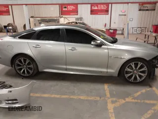 2015 Jaguar XJ with VIN SAJWA1CZ8F8V83873, listed as a IAAI auction lot 41271111 with 94,830 mi miles. Bid and sale history available at carsss.com. Image 14.