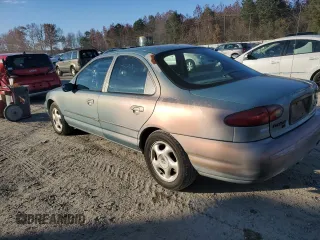 1997 Ford Contour с VIN 3FALP6535VM112253, выставлен на аукционе Copart как лот 80501924 с пробегом 116 778 миль миль и Списание • Salvage title. История ставок и продаж доступна на DreamBid. Изображение 2.