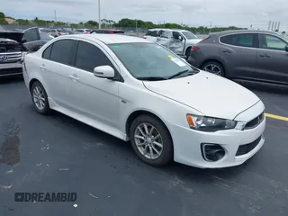 2016 Mitsubishi Lancer ES z VIN JA32U2FU7GU000923, wystawiony jako IAAI lot #42238951 z przebiegiem 134 955 mil mil oraz . Historia ofert i sprzedaży dostępna na DreamBid. Obrazek 1.