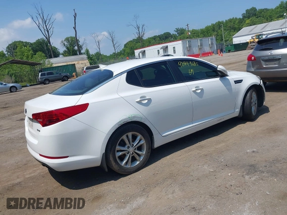 2013 Kia Optima EX z VIN 5XXGN4A70DG091603, wystawiony jako IAAI lot #42449685 z przebiegiem 167 384 mil mil oraz . Historia ofert i sprzedaży dostępna na DreamBid. Obrazek 4.
