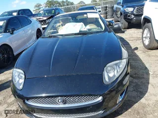 2014 Jaguar XK with VIN SAJWA4GB0ELB52358, listed as a IAAI auction lot 41832850 with 93,037 mi miles. Bid and sale history available at carsss.com. Image 13.