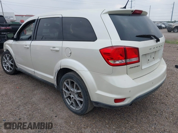 2013 Dodge Journey R/T with VIN 3C4PDCEG5DT642751, listed as a IAAI auction lot 42306951 with 129,338 mi miles and . Bid and sale history available at DreamBid. Image 3.