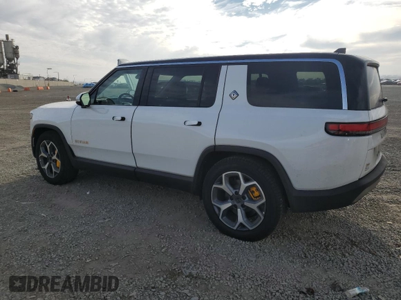 2024 Rivian R1S Adventure z VIN 7PDSGABA4RN043975, wystawiony jako Copart lot #41524615 z przebiegiem 6 807 mil mil oraz Szkoda całkowita • Salvage title. Historia ofert i sprzedaży dostępna na DreamBid. Obrazek 2.
