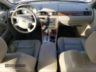 2005 Ford Five Hundred Limited with VIN 1FAFP28105G189607, listed as a Copart auction lot 76132644 with 164,154 mi miles and Clean Title. Bid and sale history available at carsss.com. Image 8.