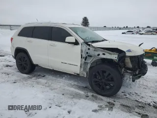 2012 Jeep Grand Cherokee Laredo with VIN 1C4RJFAT4CC335104, listed as a Copart auction lot 45306185 with 120,086 mi miles and Salvage Title. Bid and sale history available at carsss.com. Image 4.