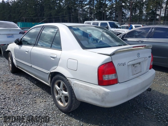 2002 Mazda Protege DX with VIN JM1BJ225520542854, listed as a IAAI auction lot 41955679 with 161,338 mi miles and . Bid and sale history available at DreamBid. Image 3.