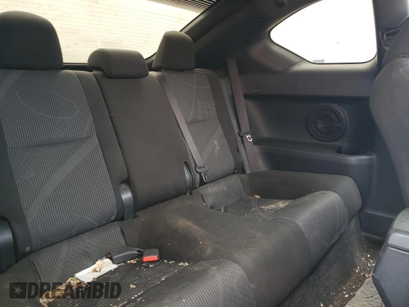 2012 Scion tC z VIN JTKJF5C75C3036478, wystawiony jako Copart lot #53190045 z przebiegiem 140 592 mil mil oraz Czysty tytuł • Clean title. Historia ofert i sprzedaży dostępna na DreamBid. Obrazek 10.