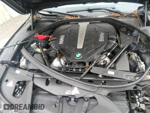 2013 BMW 7 Series 750Li xDrive with VIN WBAYF8C51DD140657, listed as a IAAI auction lot 32751348 with 128,816 mi miles. Bid and sale history available at carsss.com. Image 10.