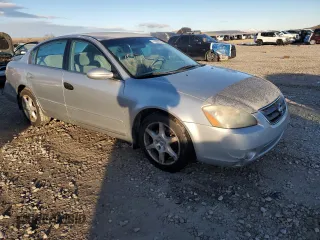 2003 Nissan Altima SE with VIN 1N4BL11D03C142767, listed as a Copart auction lot 41680035 with 216,963 mi miles and Salvage title. Bid and sale history available at DreamBid. Image 4.