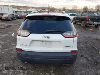 2019 Jeep Cherokee Latitude Plus with VIN 1C4PJMLX2KD254946, listed as a IAAI auction lot 41581777 with 49,748 mi miles. Bid and sale history available at carsss.com. Image 16.