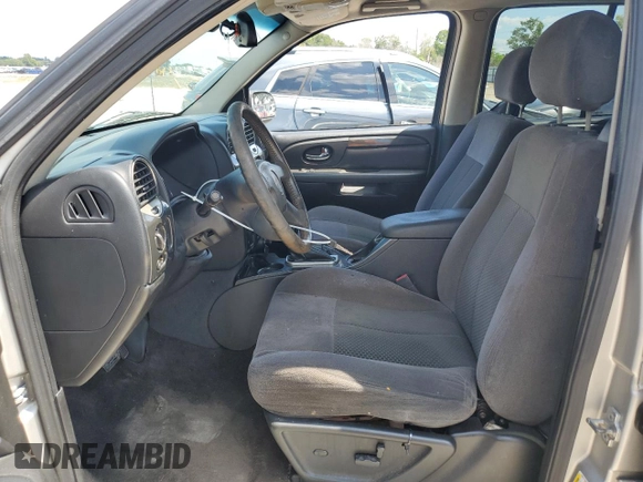 2007 GMC Envoy SLT with VIN 1GKDS13SX72163482, listed as a Copart auction lot 72439864 with 218,719 mi miles and Salvage Title. Bid and sale history available at carsss.com. Image 7.