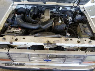 1990 Ford Bronco z VIN 1FMCU14T9LUA62663, wystawiony jako Copart lot #85040114 z przebiegiem 9 963 mil mil oraz Czysty tytuł • Clean title. Historia ofert i sprzedaży dostępna na DreamBid. Obrazek 12.