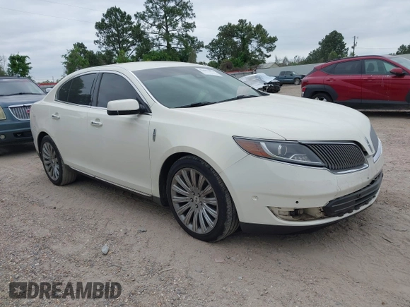 2013 Lincoln MKS with VIN 1LNHL9DKXDG604710, listed as a IAAI auction lot 42001875 with 117,724 mi miles and . Bid and sale history available at DreamBid. Image 1.