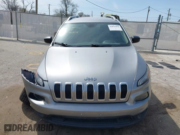2015 Jeep Cherokee Sport with VIN 1C4PJLAB2FW696010, listed as a IAAI auction lot 42032956 with 88,323 mi miles. Bid and sale history available at carsss.com. Image 12.