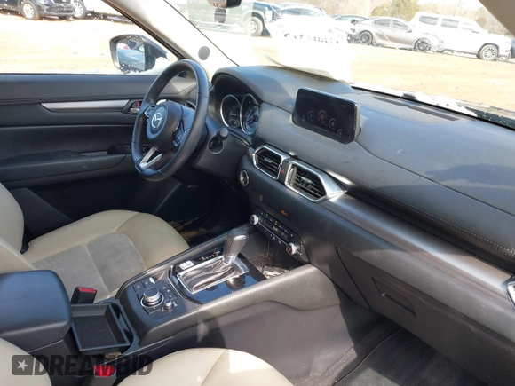 2020 Mazda CX-5 Touring z VIN JM3KFBCMXL1741182, wystawiony jako IAAI lot #41602315 z przebiegiem 31 582 mil mil oraz . Historia ofert i sprzedaży dostępna na DreamBid. Obrazek 5.
