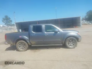 2019 Nissan Frontier SV z VIN 1N6AD0ER8KN751964, wystawiony jako IAAI lot #41879817 z przebiegiem 111 289 mil mil oraz . Historia ofert i sprzedaży dostępna na DreamBid. Obrazek 14.