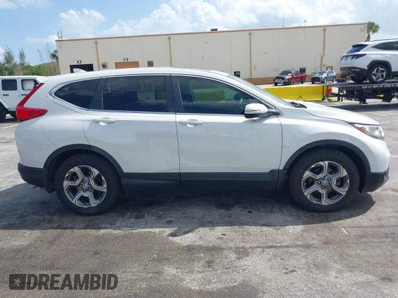 2019 Honda CR-V EX with VIN 5J6RW1H51KA007719, listed as a IAAI auction lot 41985574 with 58,696 mi miles. Bid and sale history available at carsss.com. Image 13.