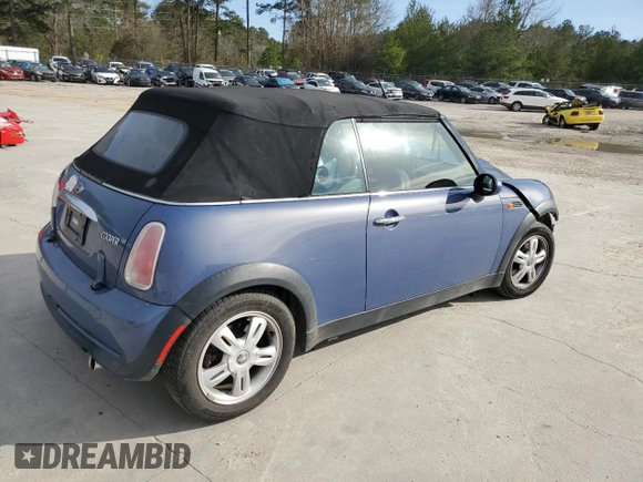 2005 MINI Convertible with VIN WMWRF33555TF62593, listed as a Copart auction lot 48305985 with 172,839 mi miles and Salvage title. Bid and sale history available at DreamBid. Image 3.