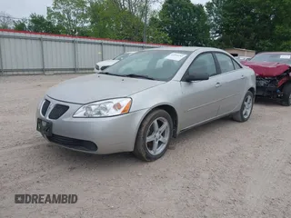 2007 Pontiac G6 with VIN 1G2ZG58N374163474, listed as a IAAI auction lot 41993283 with 210,009 mi miles. Bid and sale history available at carsss.com. Image 2.
