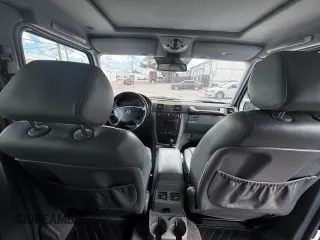 2003 Mercedes-Benz G-Class with VIN WDCYR49EX3X136883, listed as a Copart auction lot 45452375 with 146,373 mi miles and Clean Title. Bid and sale history available at carsss.com. Image 9.