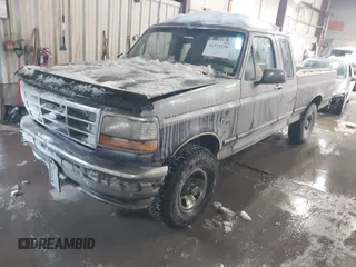 1995 Ford F-150 with VIN 1FTEX14H6SKB02515, listed as a IAAI auction lot 41574230 with 138,465 mi miles. Bid and sale history available at carsss.com. Image 2.