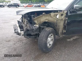 2018 Toyota Tacoma SR with VIN 5TFSX5EN1JX062523, listed as a IAAI auction lot 42334816 with 56,994 mi miles and . Bid and sale history available at DreamBid. Image 6.