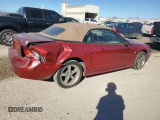 2004 Ford Mustang Deluxe with VIN 1FAFP44684F168134, listed as a Copart auction lot 46898385 with 124,391 mi miles and Salvage Title. Bid and sale history available at carsss.com. Image 3.