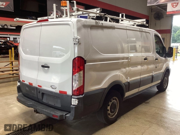 2015 Ford Transit Cargo with VIN 1FTNR1ZM1FKA44965, listed as a IAAI auction lot 42679340 with 151,641 mi miles and . Bid and sale history available at DreamBid. Image 26.
