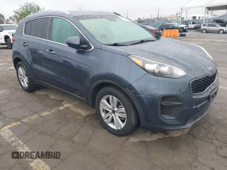 2018 Kia Sportage LX with VIN KNDPM3ACXJ7413596, listed as a IAAI auction lot 41871847 with 72,959 mi miles and . Bid and sale history available at carsss.com. Image 1.