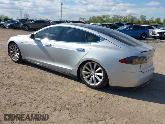 2012 Tesla Model S Performance with VIN 5YJSA1DP3CFP01348, listed as a IAAI auction lot 42185490 with 181,217 mi miles and . Bid and sale history available at DreamBid. Image 3.