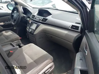 2015 Honda Odyssey EX z VIN 5FNRL5H41FB059667, wystawiony jako IAAI lot #42274039 z przebiegiem 196 687 mil mil oraz . Historia ofert i sprzedaży dostępna na DreamBid. Obrazek 5.