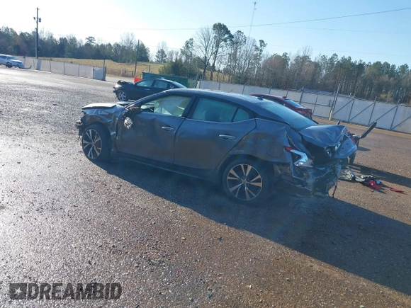 2016 Nissan Maxima SV z VIN 1N4AA6APXGC386974, wystawiony jako IAAI lot #41738932 z przebiegiem 132 395 mil mil oraz . Historia ofert i sprzedaży dostępna na DreamBid. Obrazek 3.
