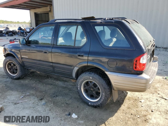 2000 Isuzu Rodeo S with VIN 4S2CK58W7Y4309261, listed as a Copart auction lot 54000775 with 187,949 mi miles and Salvage title. Bid and sale history available at DreamBid. Image 2.