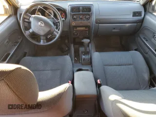 2004 Nissan Frontier XE z VIN 1N6ED27T34C449972, wystawiony jako Copart lot #87205714 z przebiegiem 254 636 mil mil oraz Szkoda całkowita • Salvage title. Historia ofert i sprzedaży dostępna na DreamBid. Obrazek 8.