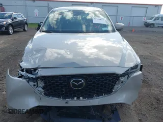 2024 Mazda CX-5 2.5 S Premium Package with VIN JM3KFBDL5R0465272, listed as a IAAI auction lot 41959823 with 12,777 mi miles. Bid and sale history available at carsss.com. Image 12.